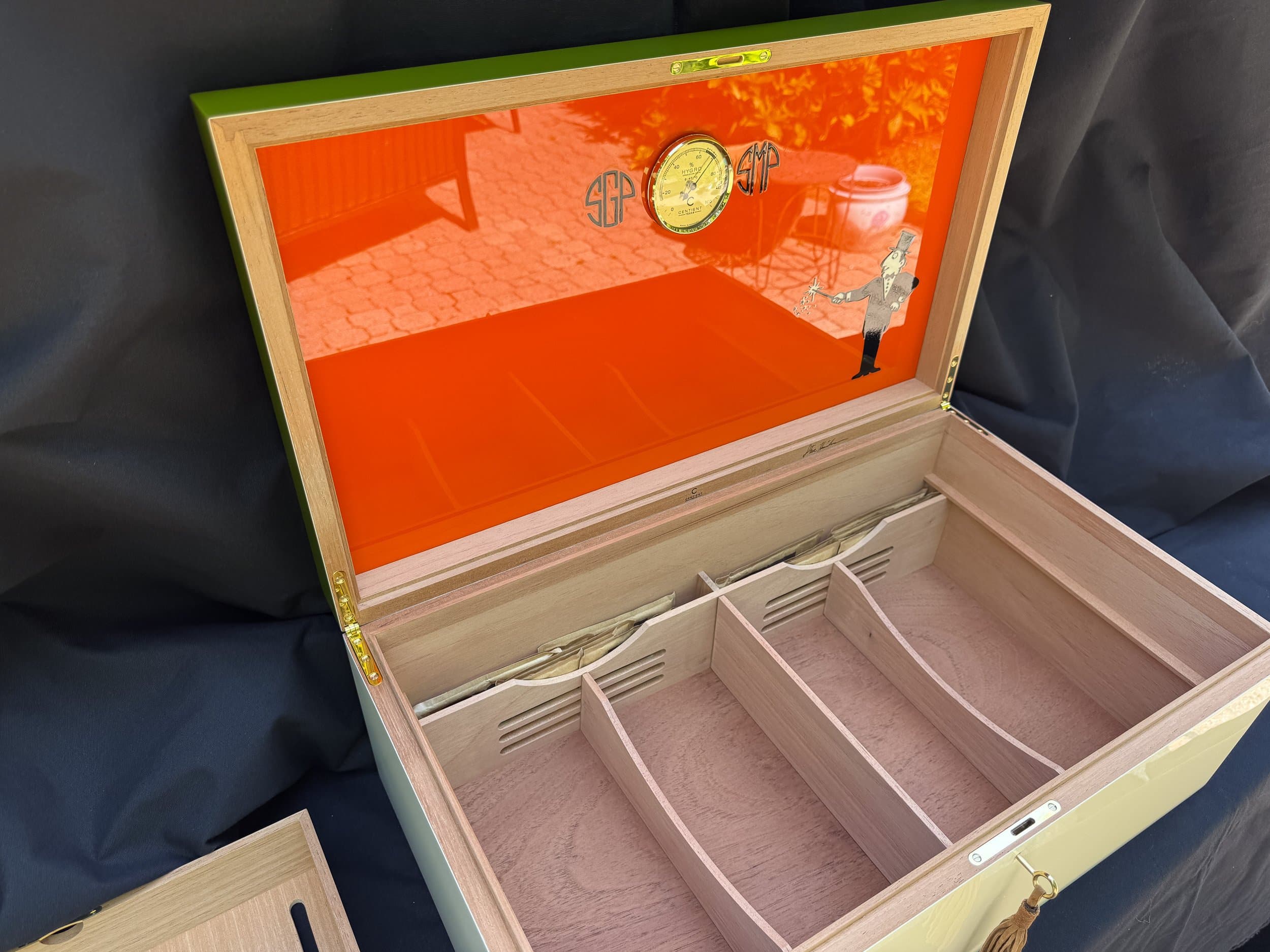 The Orangerie: centient luxury avocado green orange humidor open empty compartments
