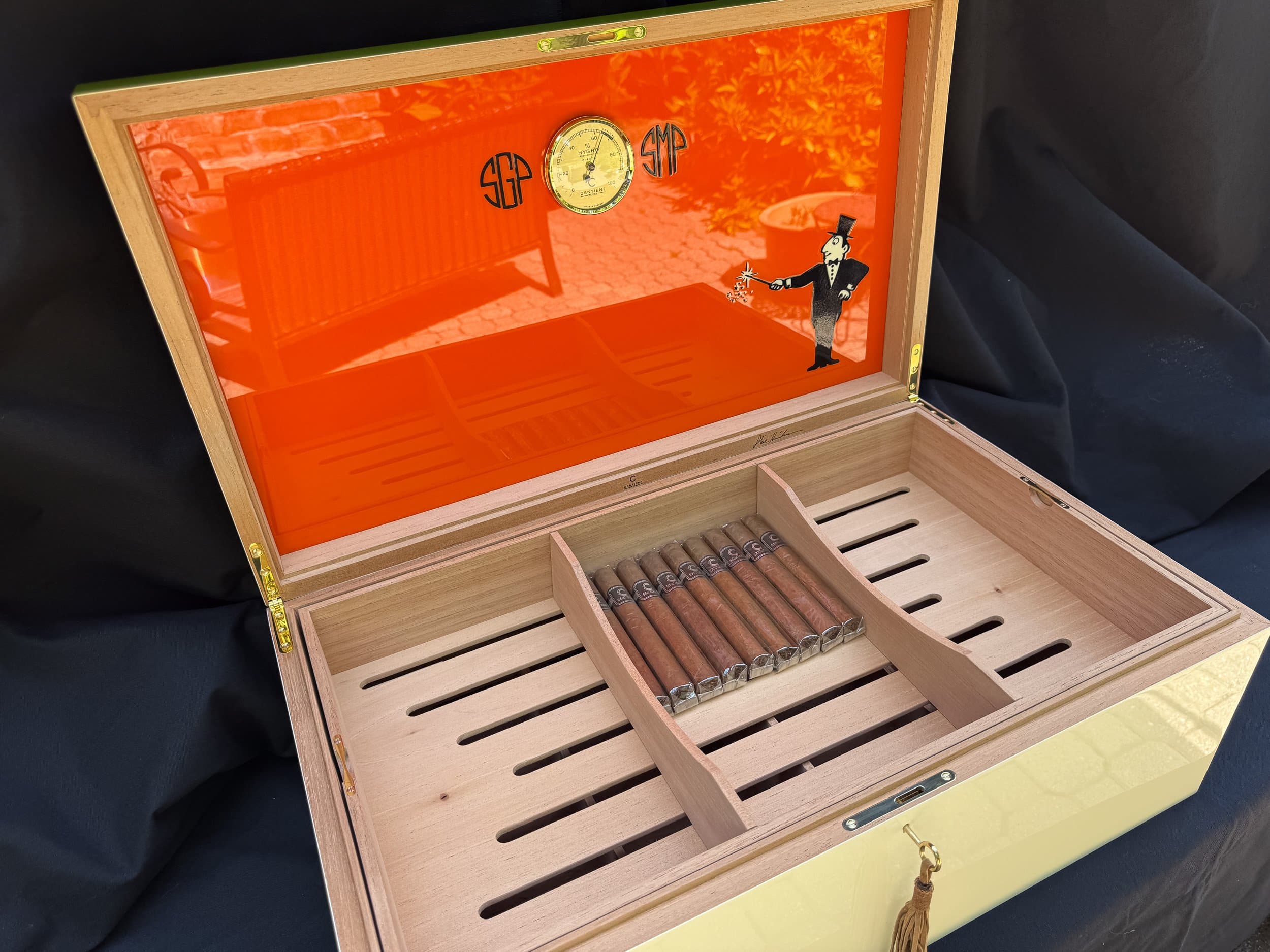 The Orangerie: centient luxury avocado green orange humidor open lid cigar tray
