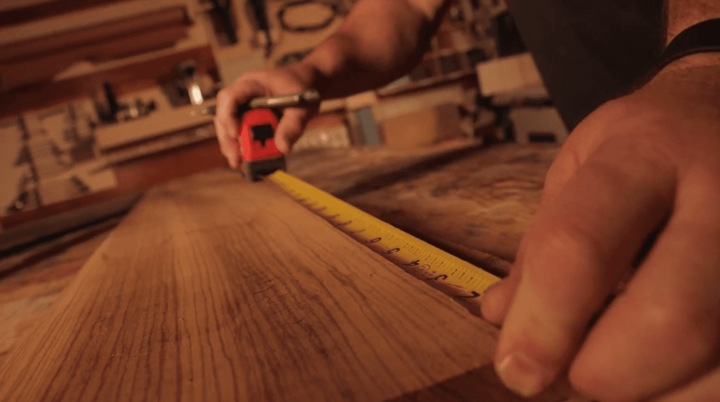 Workshop overview with veneered panels and assemblies in progress
