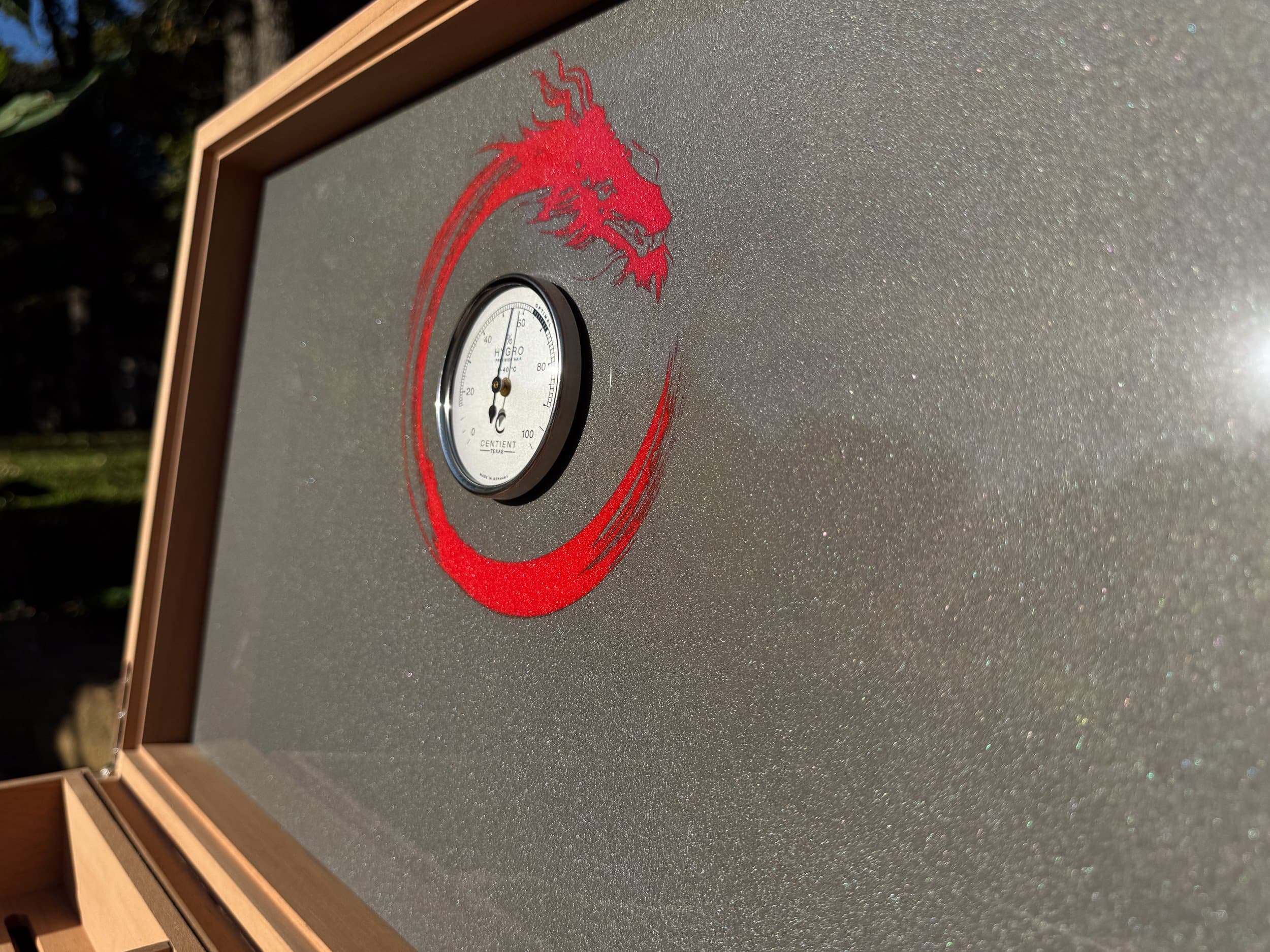 The Draconis: centient red dragon humidor inside lid angle