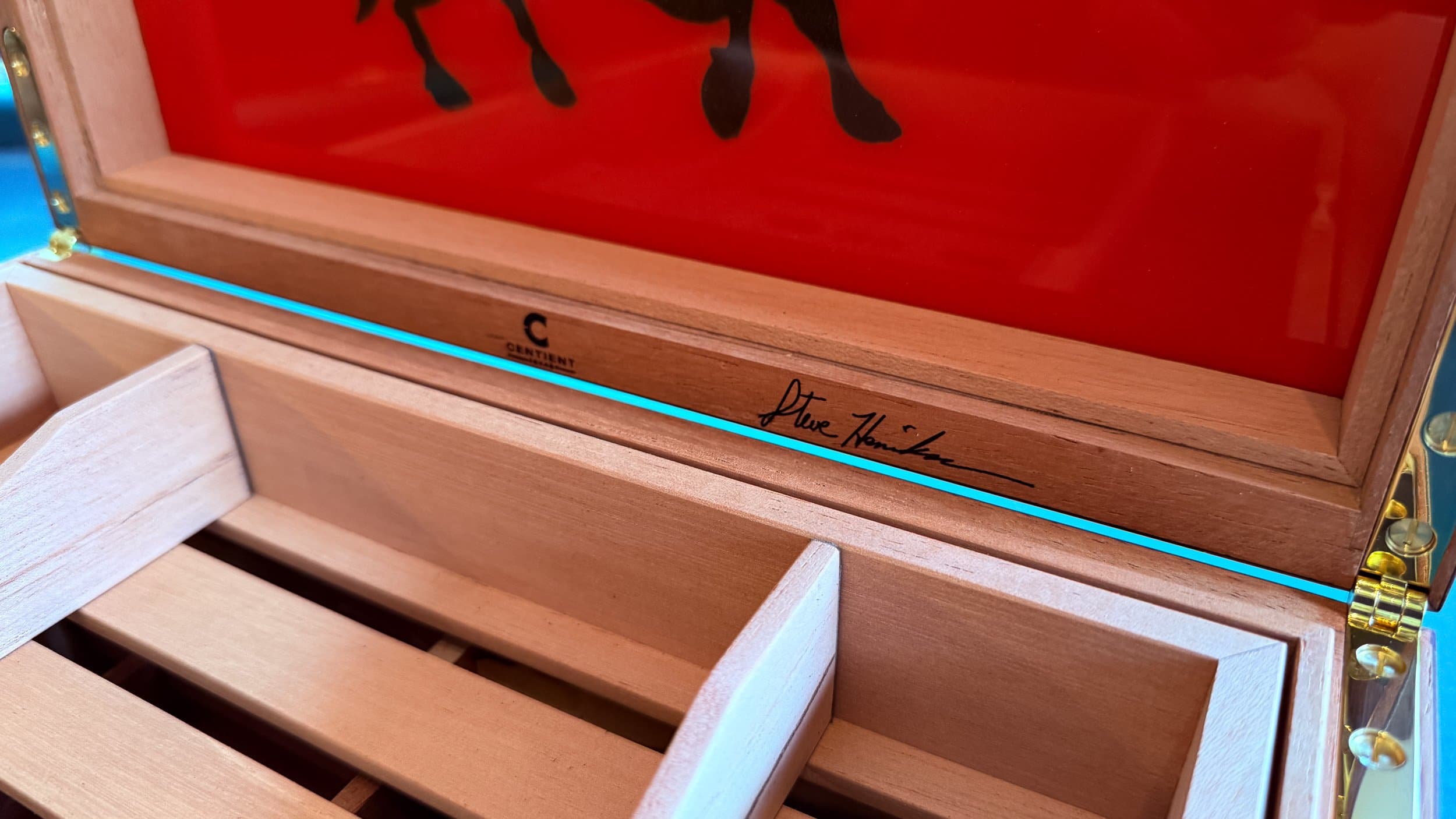 The Toro: centient luxury walnut burl humidor interior branding signature bull