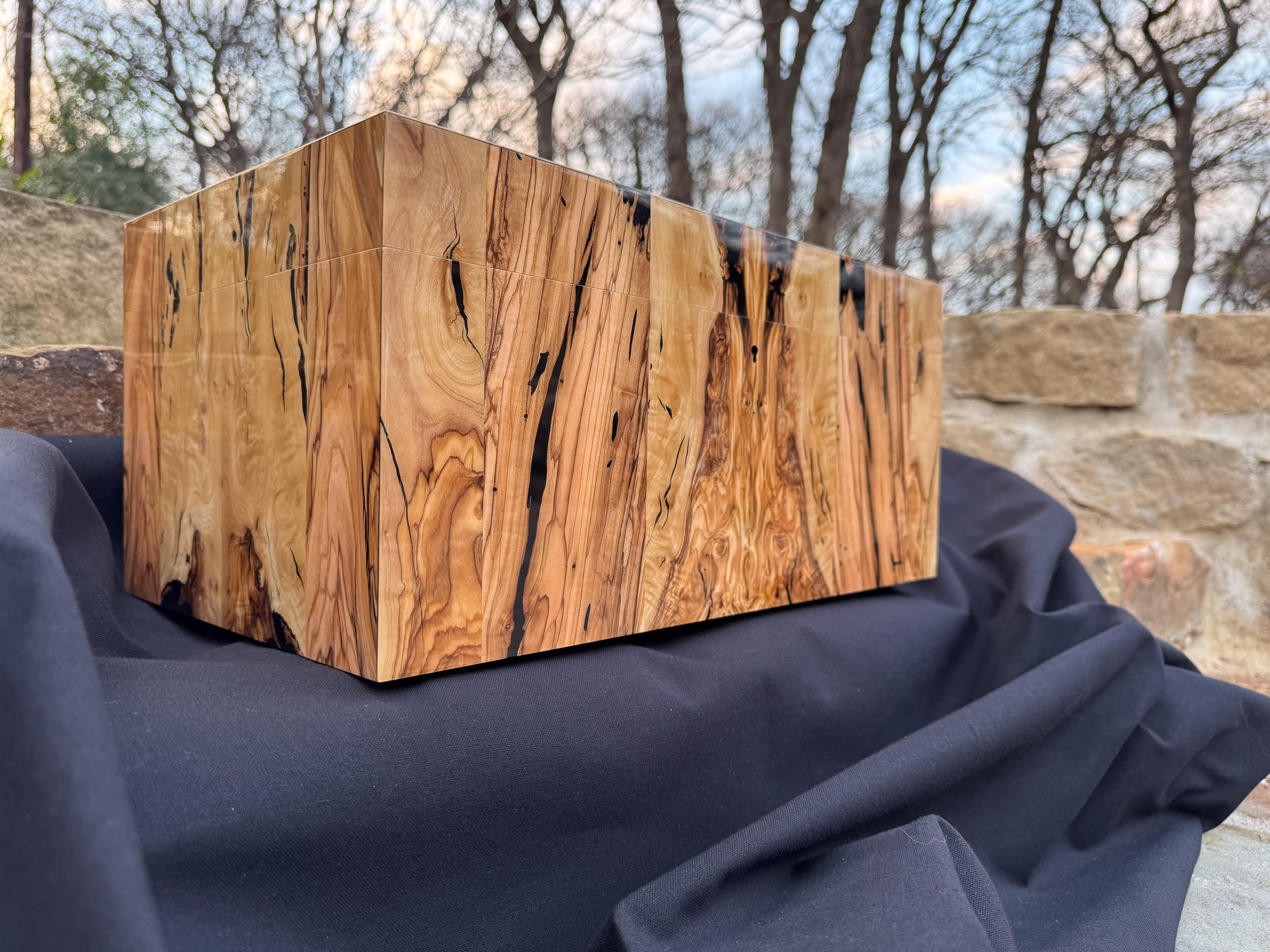 The Bethlehem: centient luxury bethlehem olivewood humidor outdoors left bottom view