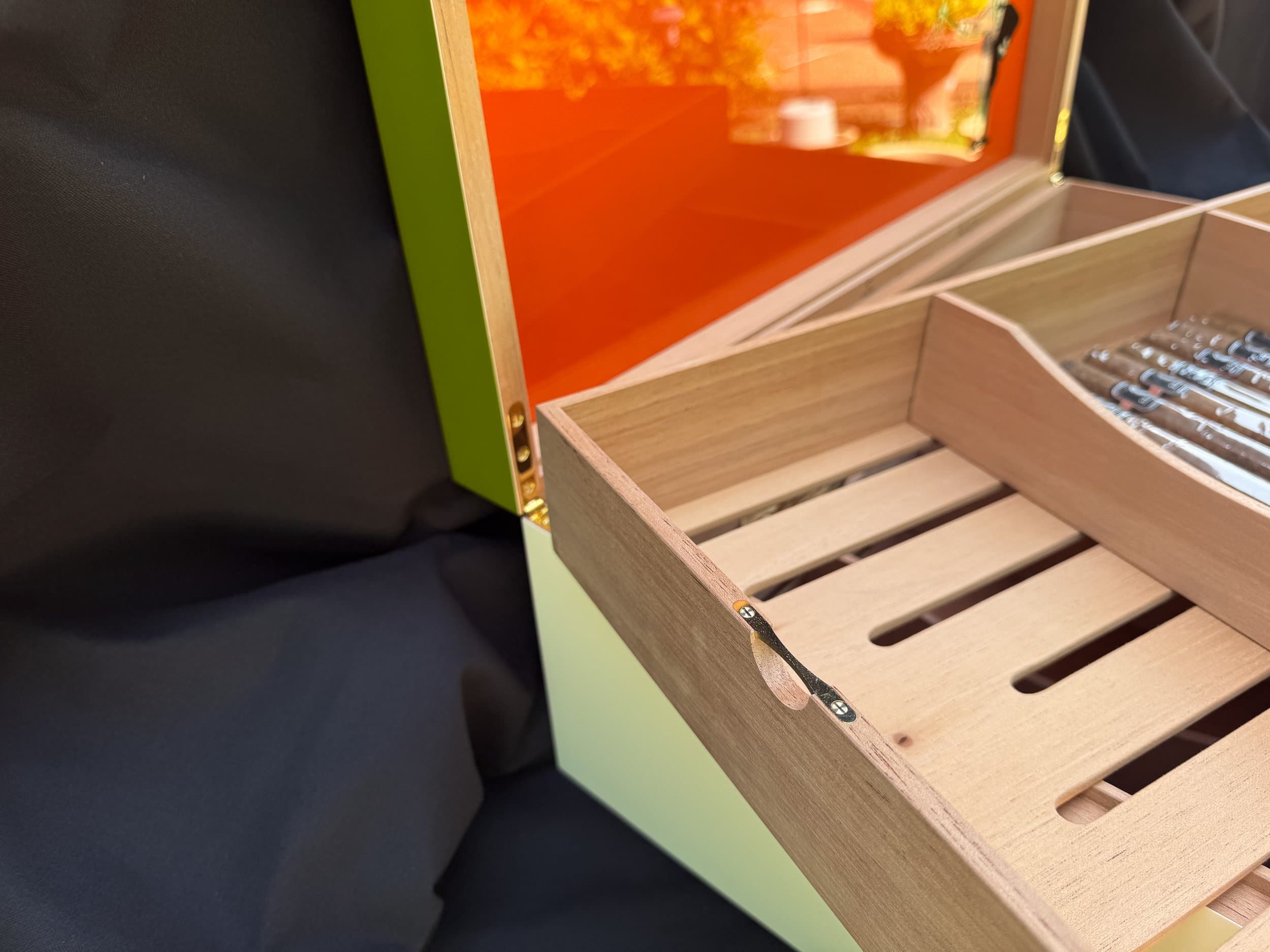 The Orangerie: centient luxury avocado green orange humidor closeup tray handles