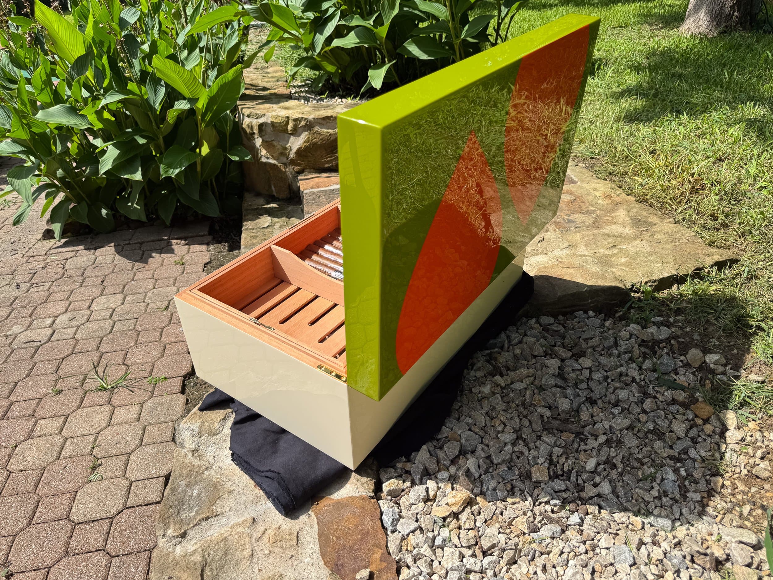 The Orangerie: centient luxury avocado green orange humidor open side outdoor back view