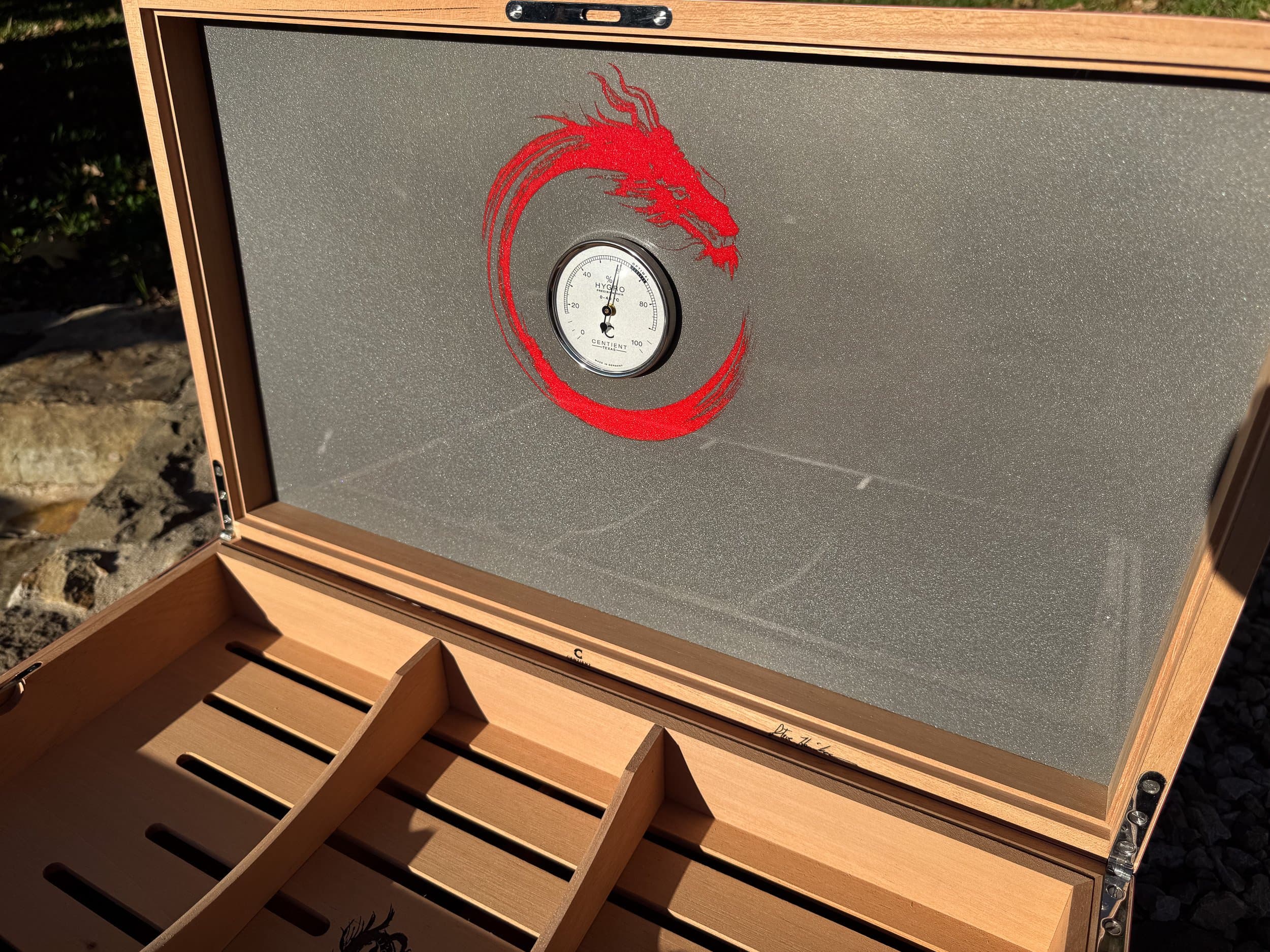The Draconis: centient red dragon humidor inside lid front view