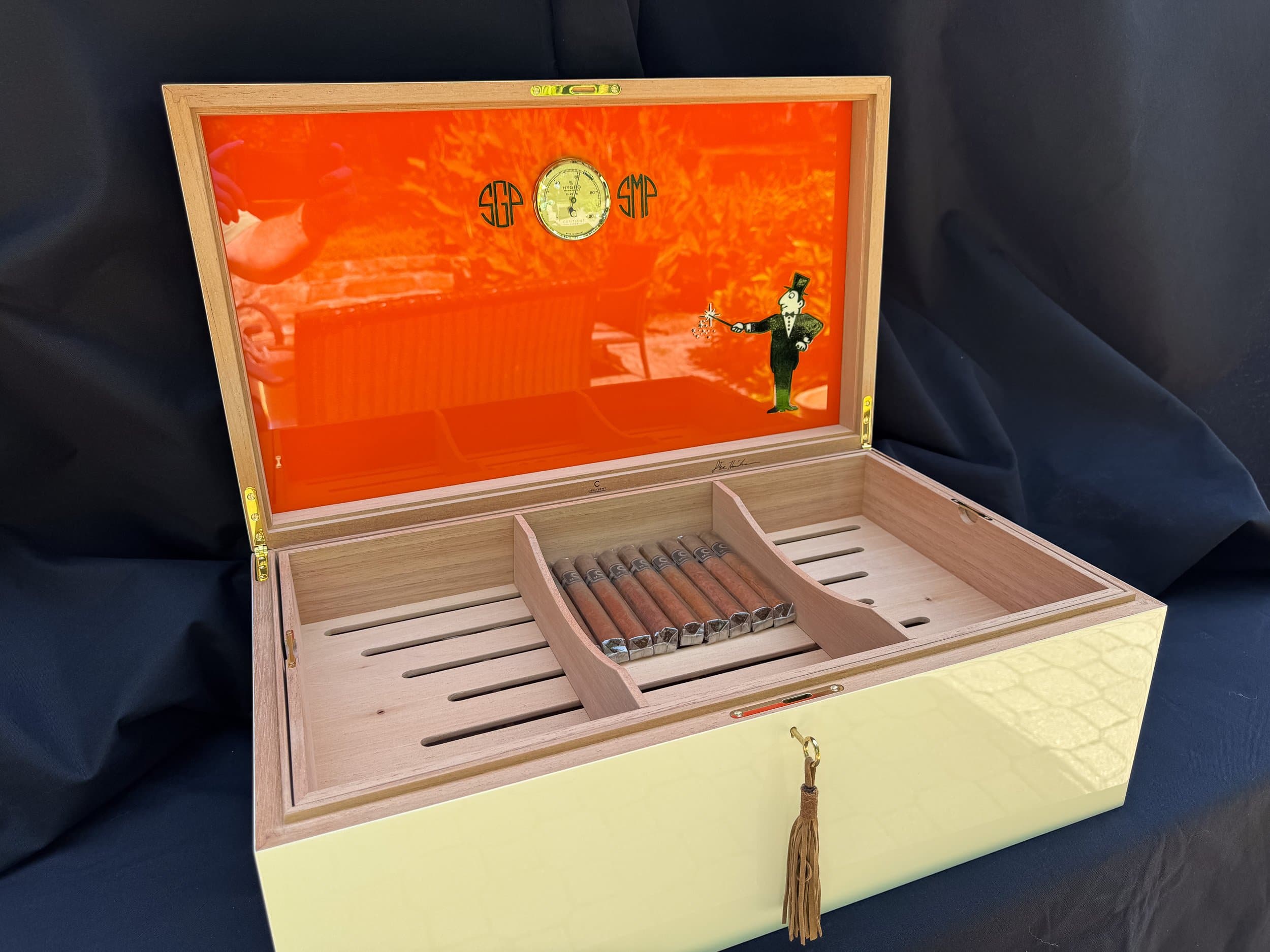 The Orangerie: centient luxury avocado green orange humidor open lid interior art