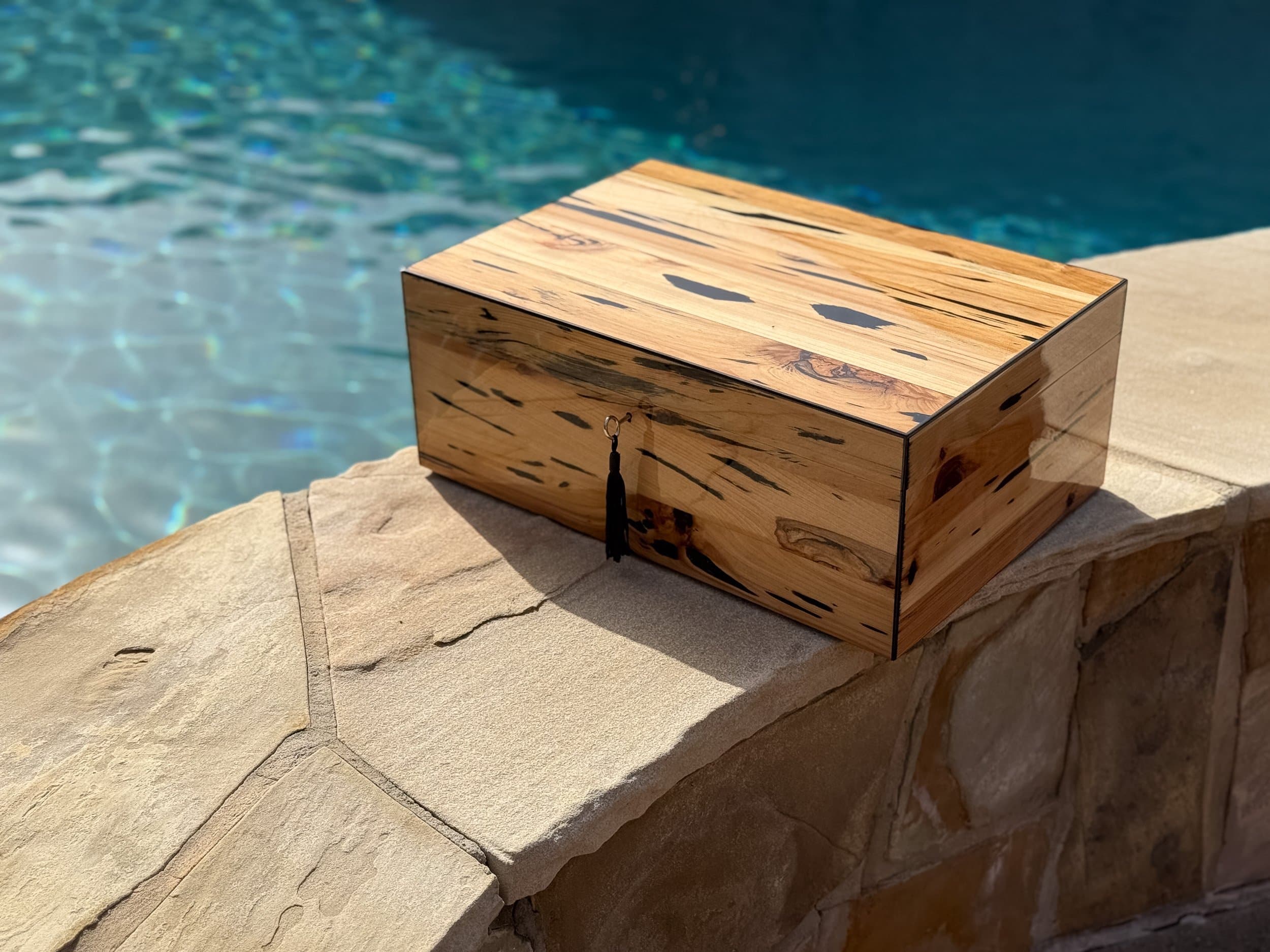 The Cypress — Blackline: centient luxury pecky cypress humidor poolside