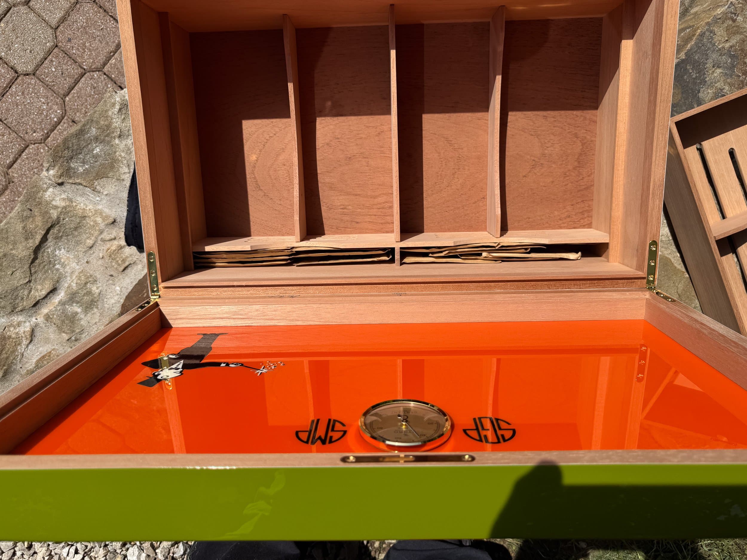 The Orangerie: centient luxury avocado green orange humidor open side outdoor overhead