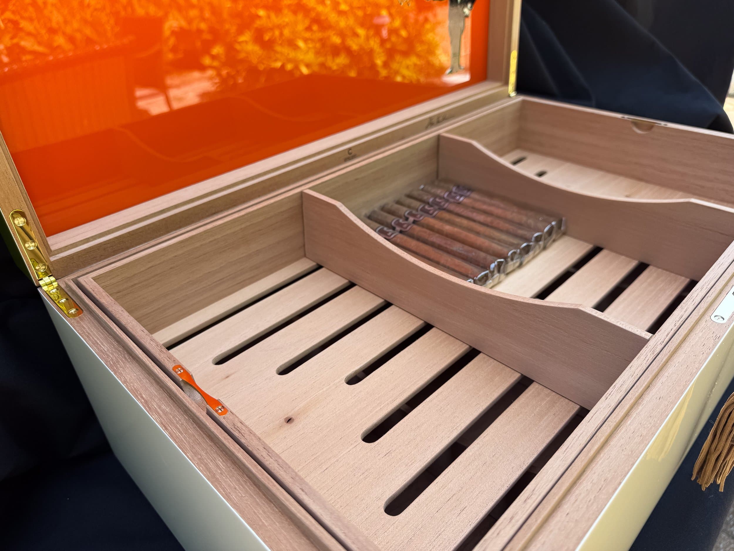 The Orangerie: centient luxury avocado green orange humidor open tray left side