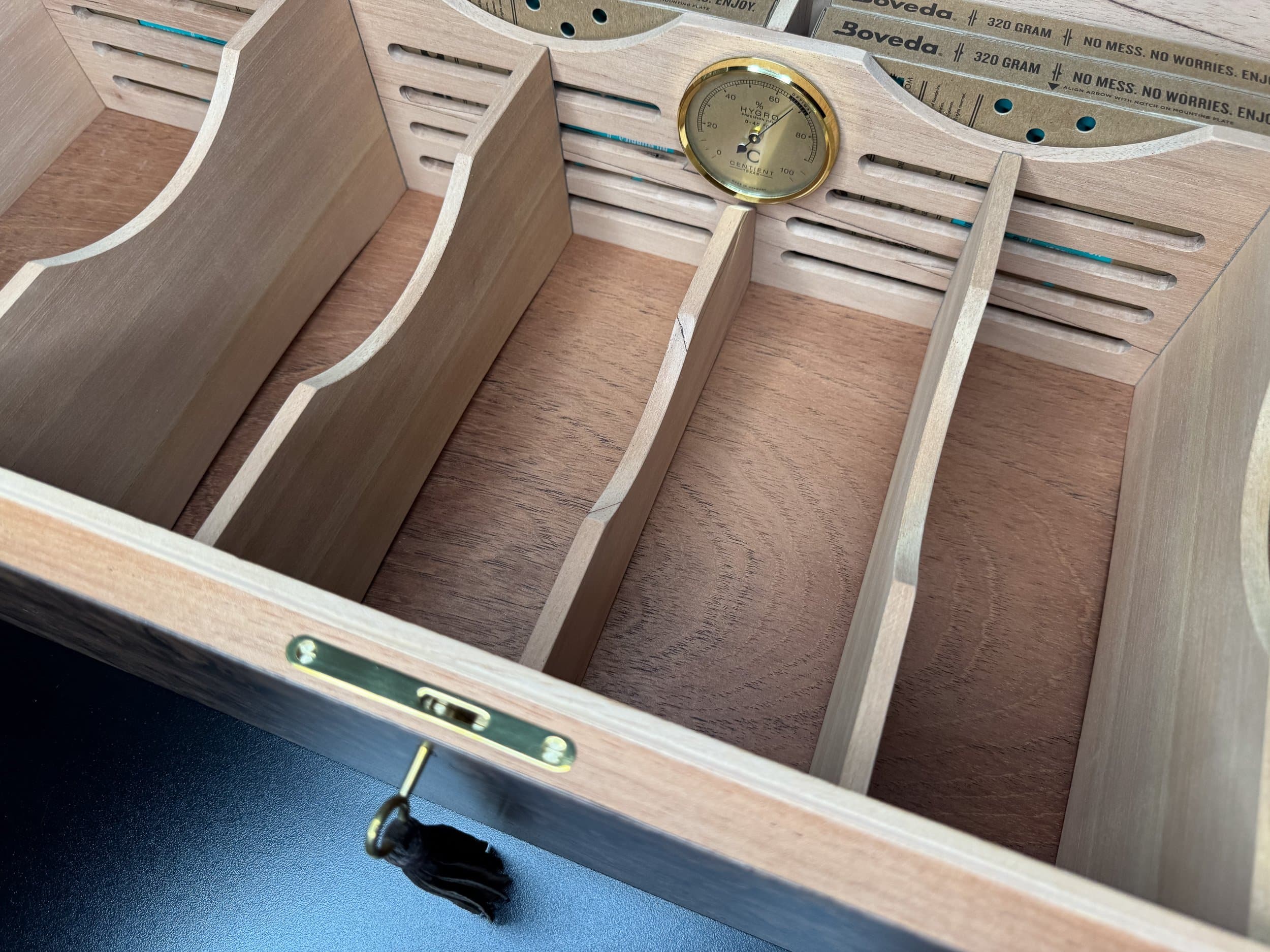 The Vitrine: centient luxury walnut burl museum glass humidor interior hygrometer boveda top view