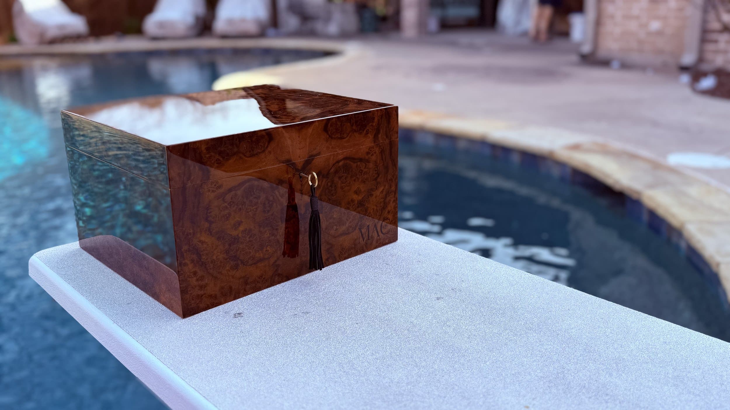 The Toro: centient luxury walnut burl humidor key tassel front angle