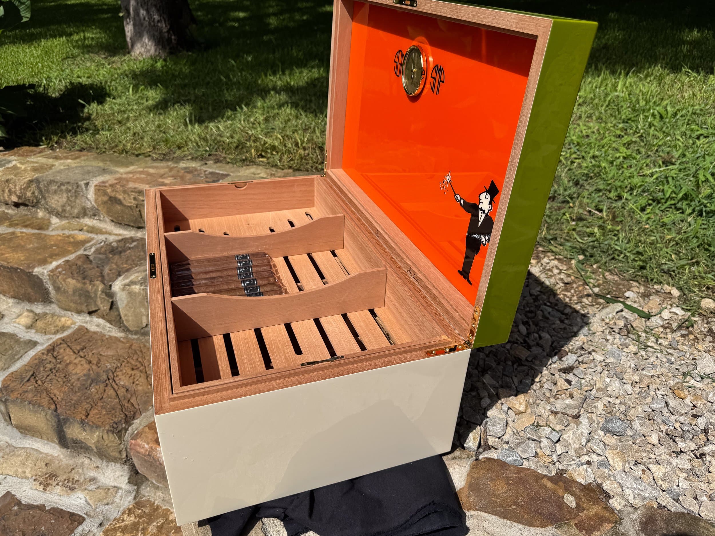 The Orangerie: centient luxury avocado green orange humidor open side outdoor side