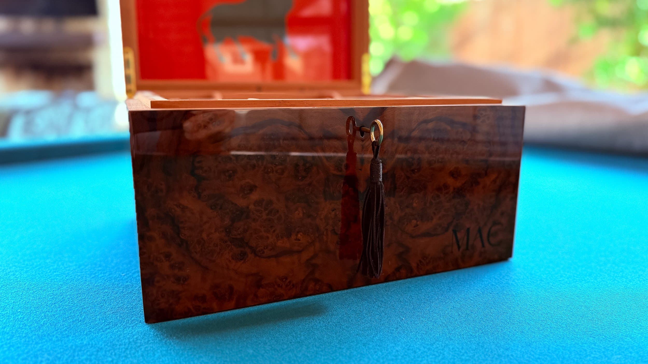 The Toro: centient luxury walnut burl humidor tassel focus