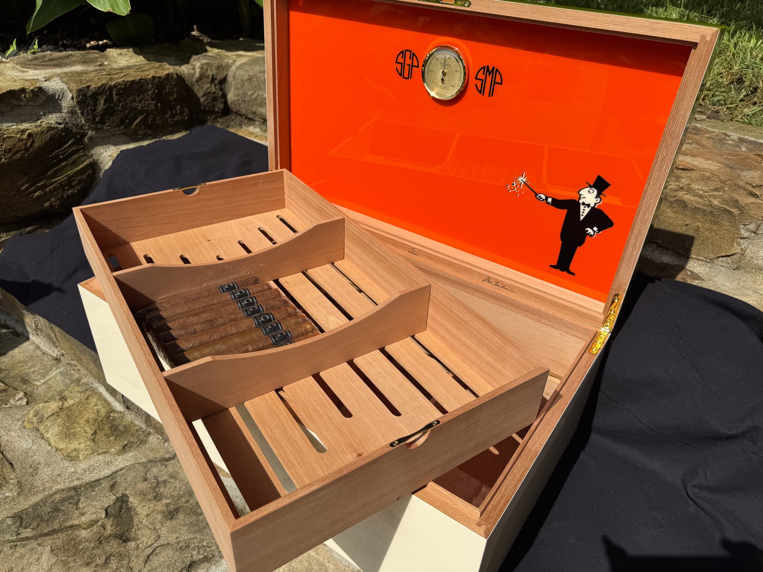 The Orangerie: centient luxury avocado green orange humidor open tray lid art outdoor