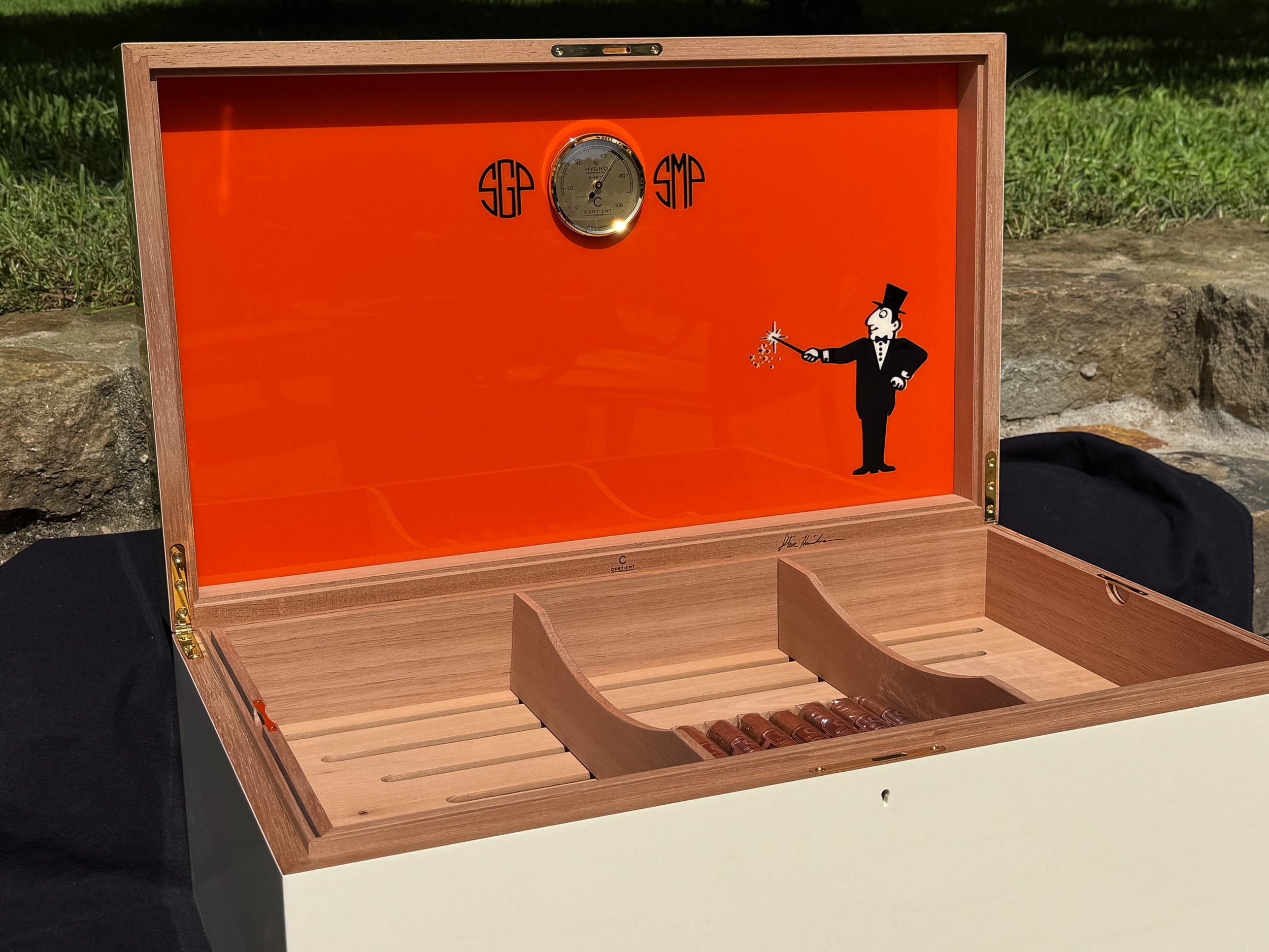 The Orangerie: centient luxury avocado green orange humidor open lid orange interior cigar tray