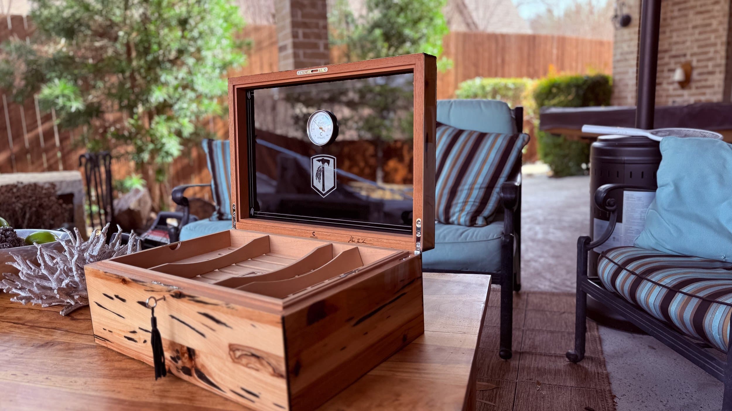 The Cypress — Blackline: centient luxury pecky cypress humidor open patio